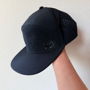 Melin Trenches Icon Hydro Performance Snapback Hat Water-Resistant Black 60cm